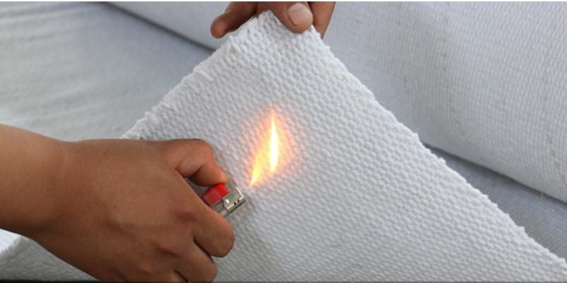 Testing fabric resistance with open flame
